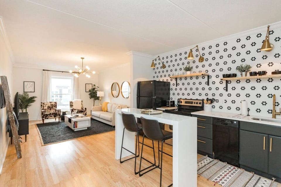 Unit 1 - Fully-stocked, updated kitchen with all cooking essentials, seating for 2 at the counter and separate room with a coffee bar.