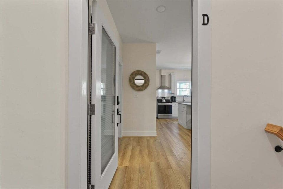 Step inside and feel right at home—this welcoming entry opens to your private upstairs retreat filled with comfort and charm.