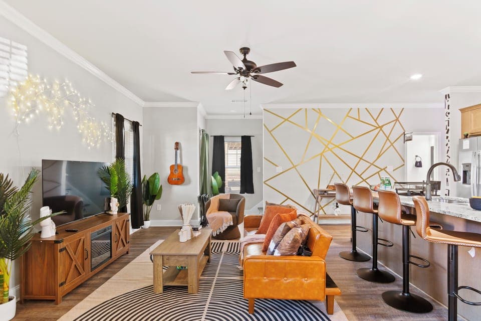 Strum a tune...unwind in the cozy embrace of this open-concept retreat.