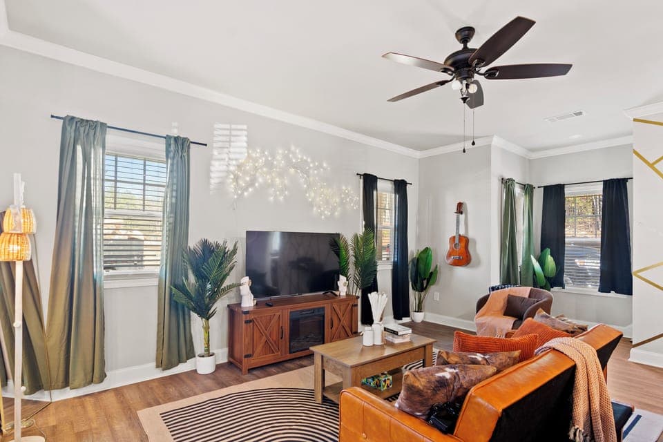Settle in for unforgettable movie nights with a smart TV and a cozy sofa
