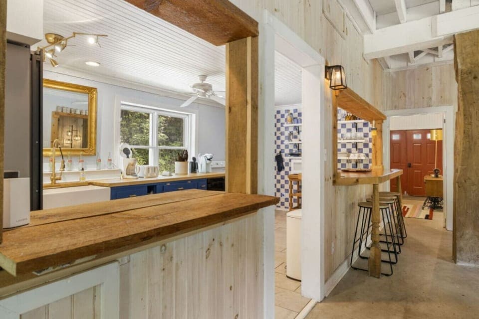 Windows into the kitchen make this space great for hosting.