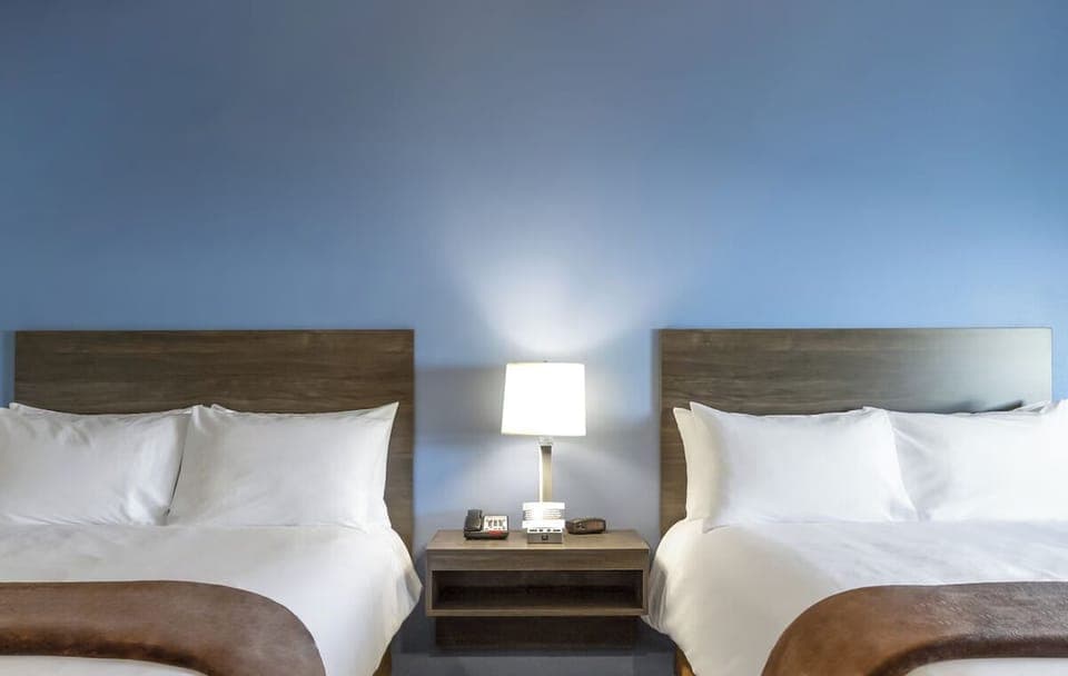 Unit with 2 Queen beds. Exact unit will be assigned upon arrival. Views, colors, and decor may vary.
