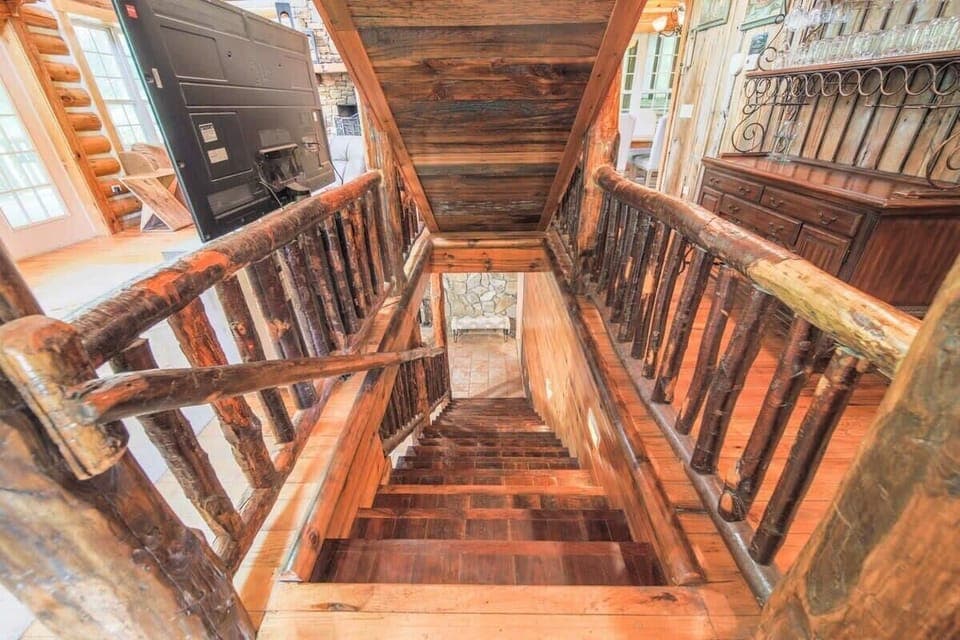 Whether you're headed up to the loft or down to movie night, these beautiful stairs connect all the comfort and fun. Rustic charm under every step!