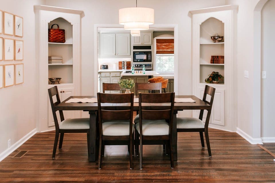 Gather 'round and make memories! ✨ This warm and inviting dining space is perfect for shared meals, game nights, or morning coffee chats—just steps from a full-equipped  kitchen!