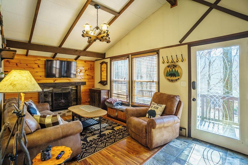 Charming bear themed living room with fireplace