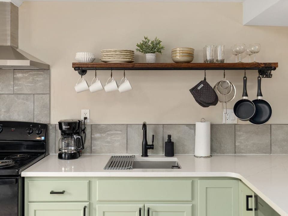 Neat, charming kitchen with everything you need for home-cooked comfort. 🏡🍽️