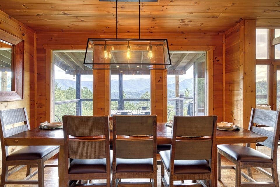 Dine together at the large table with mountain views.