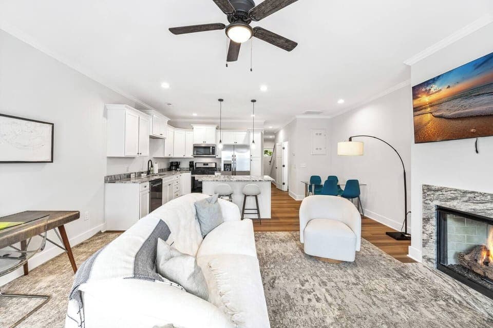 A seamless blend of living, dining, and kitchen areas makes this space ideal for entertaining and connecting.