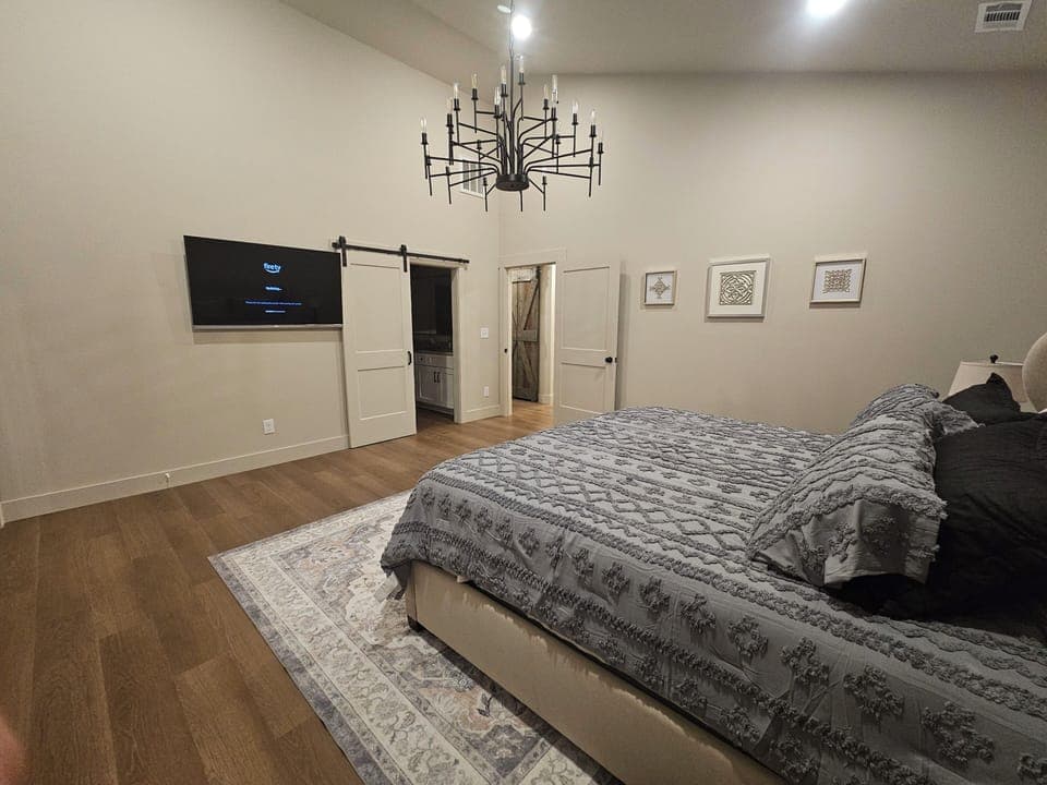 BEDROOM 1 - MASTER WITH KING BED AND TV