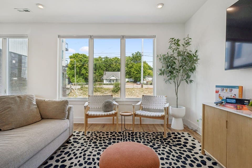 Living Room: Light, airy, and inviting. This living room is the perfect gathering spot for making memories.