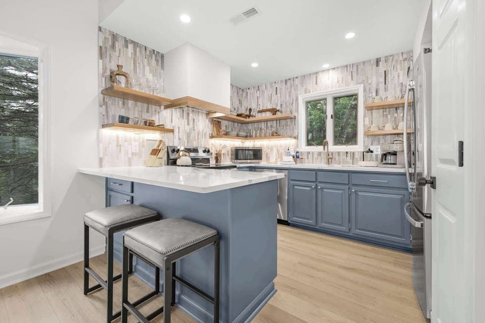 Have a few drinks at the kitchen island while watching the designated chef in action.