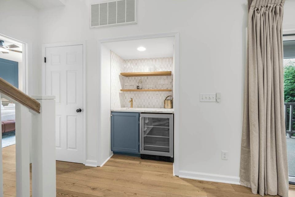 Fix yourself a drink at the wet bar before sitting down and discussing upcoming adventures with your loved ones.