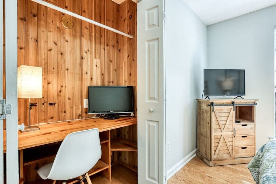 Closet has hidden private desk area