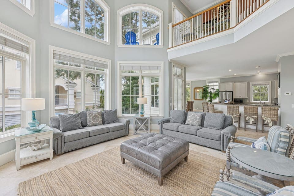 Gather your group with comfortable seating of two sofas, two chairs, and an ottoman.