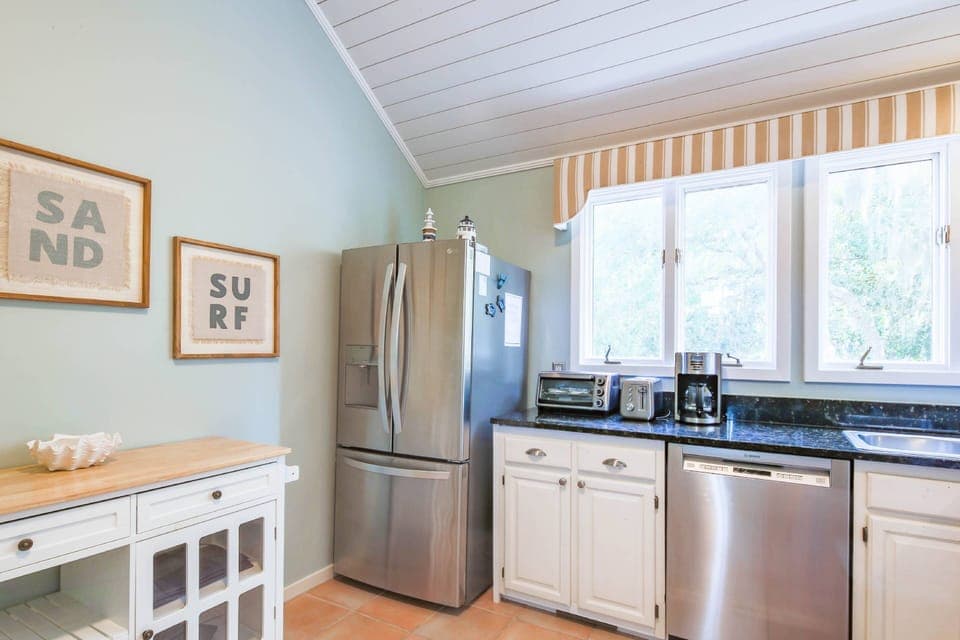 There is also a stainless steel refrigerator.