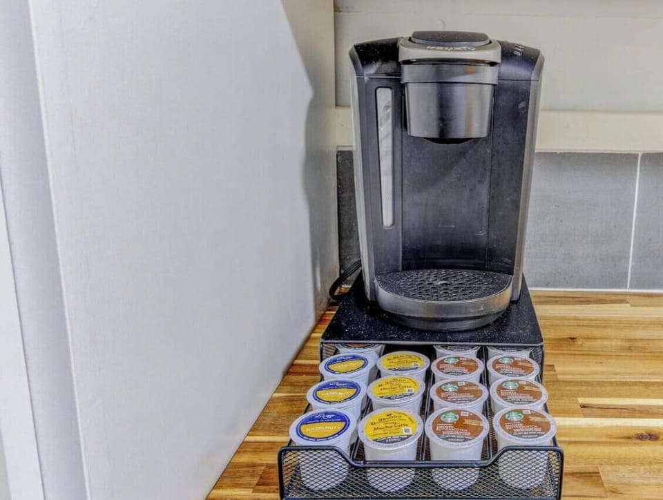 Enjoy a fresh cup of coffee anytime with the Keurig machine and pods provided.