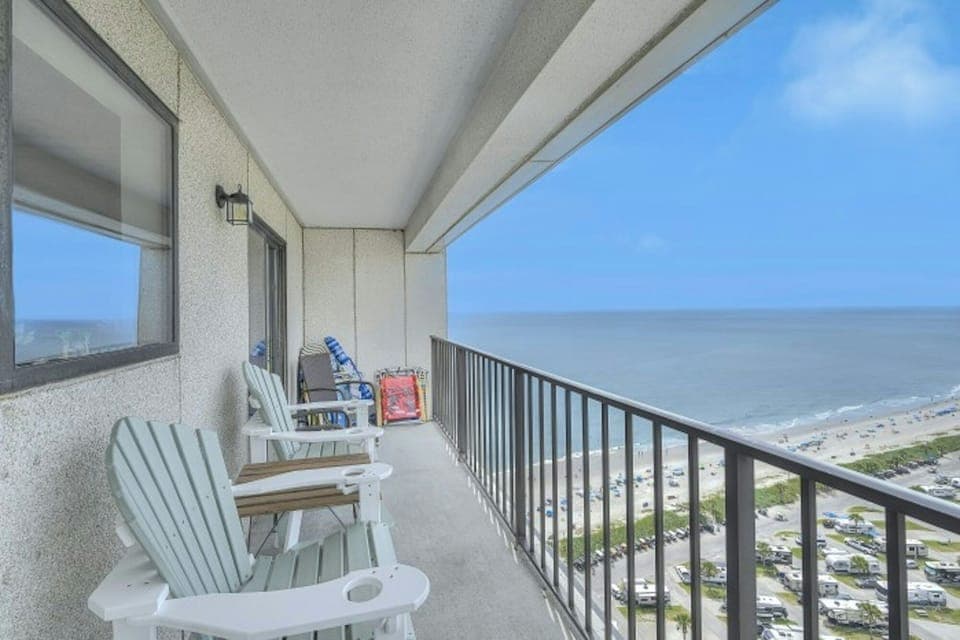 Have  your morning coffee while watching the waves rolling onto the shore.