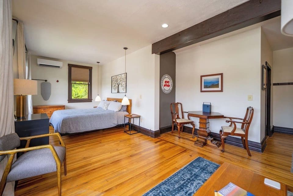 Room #4 on the second floor with a king bed, pullout queen sofa bed and an en suite bathroom.
