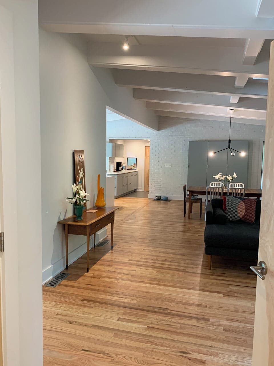 Den looking into Kitchen and Pantry