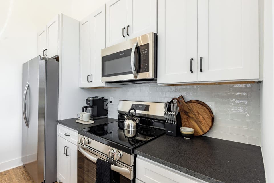 Sleek kitchen, modern appliances (Unit 101, 201, 202, 301, 302, 401, 402)