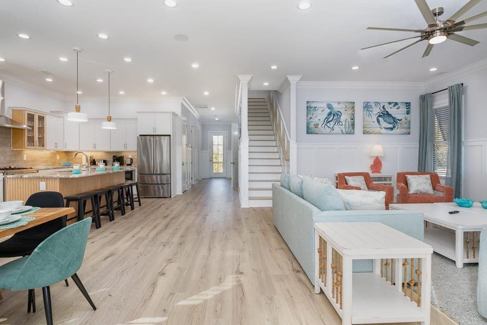 Spacious open-concept living and dining area with modern flair
