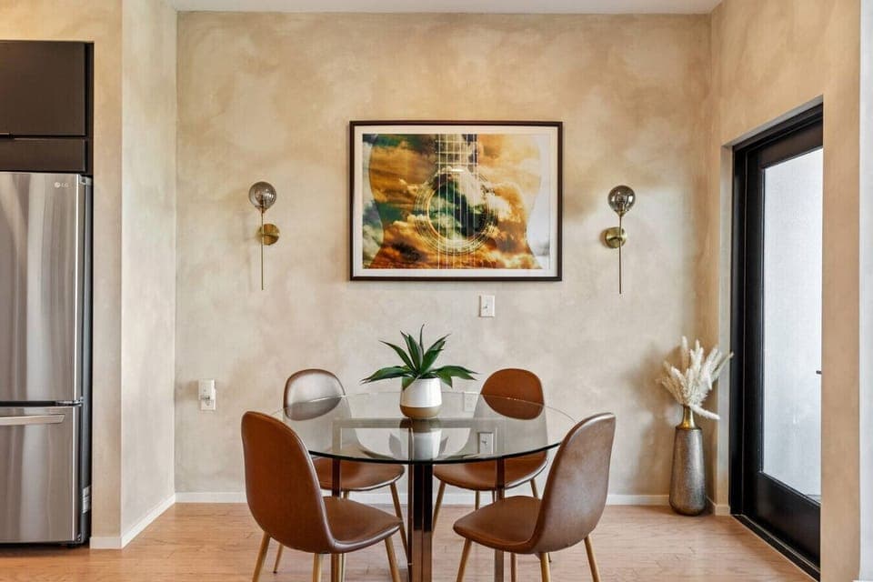 Fully equipped kitchen with high-end appliances, seating for 4 at our dining table.