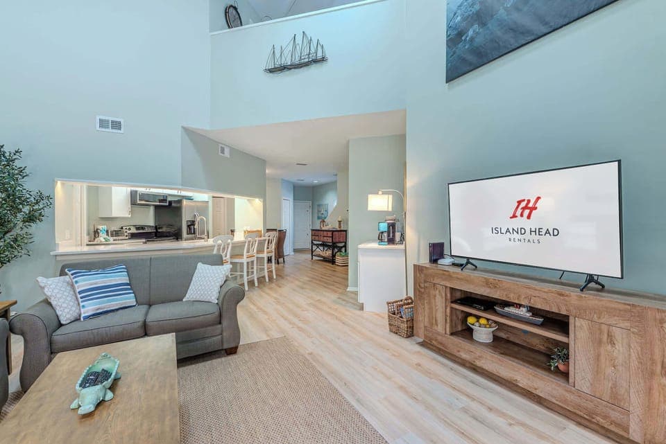 Spacious, sun-filled living area with an open layout perfect for gathering and unwinding.