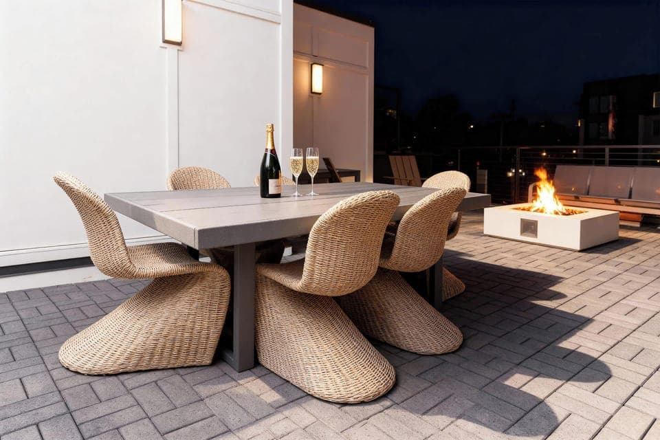 Unwind under the stars at your Nashville getaway! This chic rooftop oasis features cozy seating and a fire pit, perfect for gathering with friends or family. Experience luxury with Misfit Homes. Reserve your stay today!