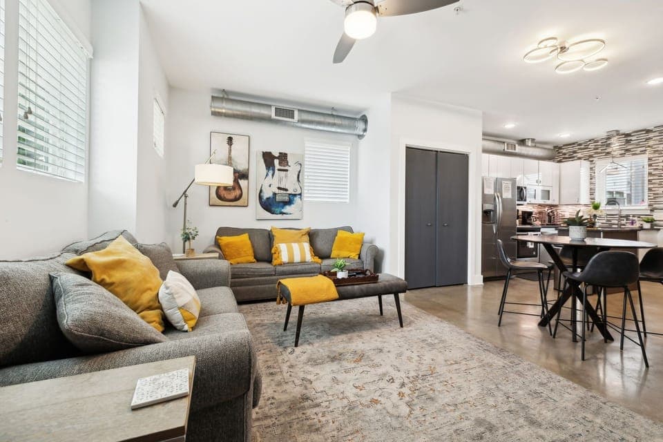 Living Room: Where modern comfort meets curated style—unwind in the heart of it all.