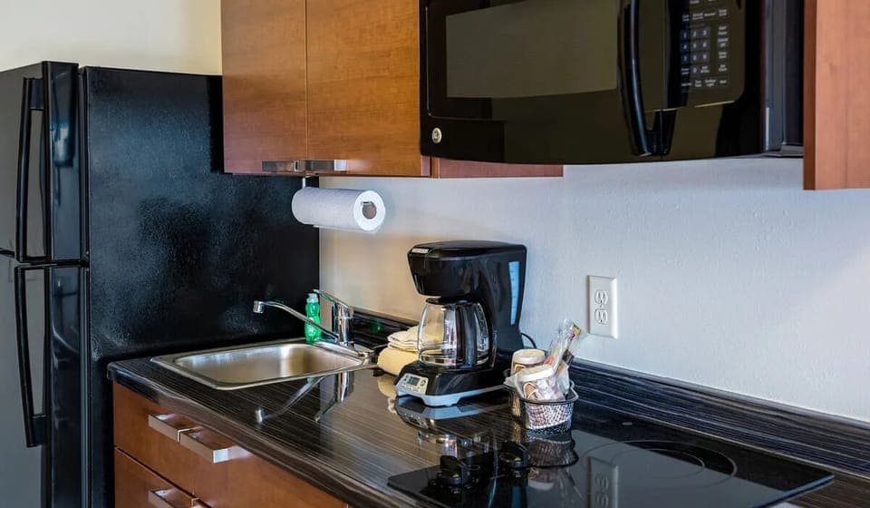 Brew morning coffee and keep drinks chilled steps away.