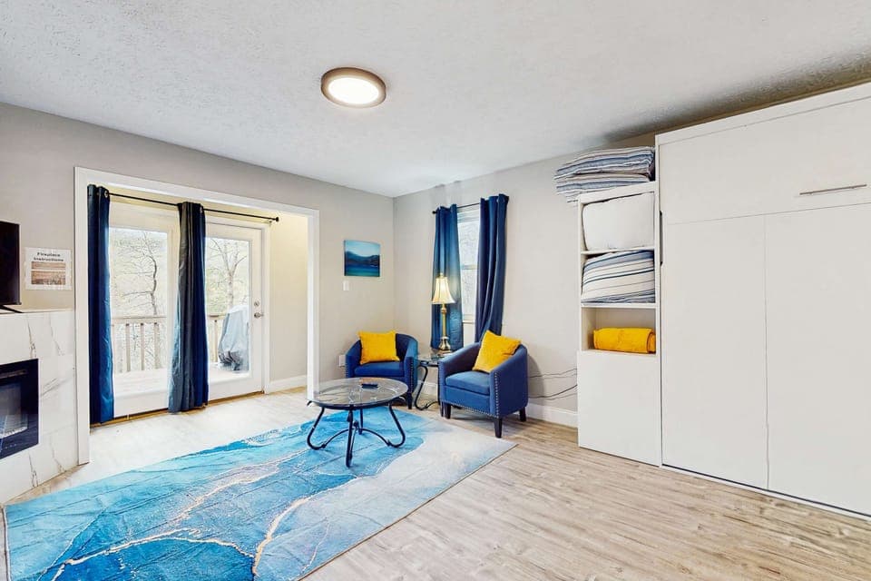 Relax in style with vibrant decor and scenic views from the balcony!