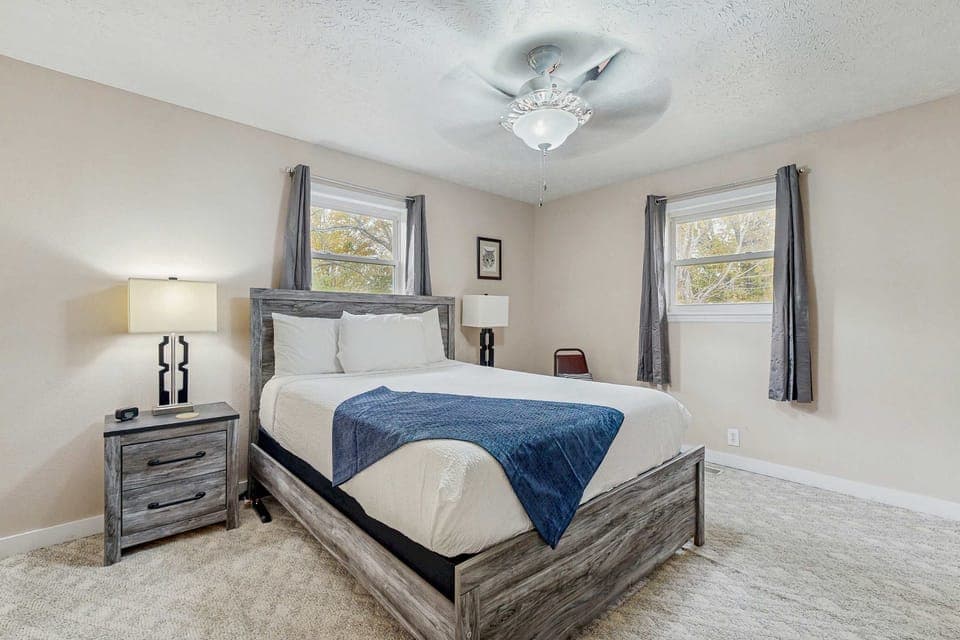 Relax in a stylish, sunlit room with inviting decor and modern comforts!