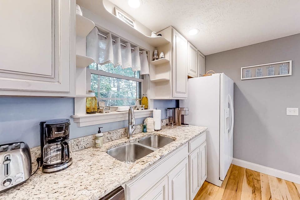 Modern appliances, granite countertops, and nature views await your culinary adventures!