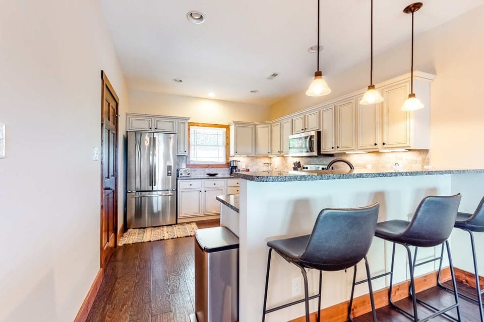 Sleek granite countertops and modern appliances create the perfect space for culinary adventures!