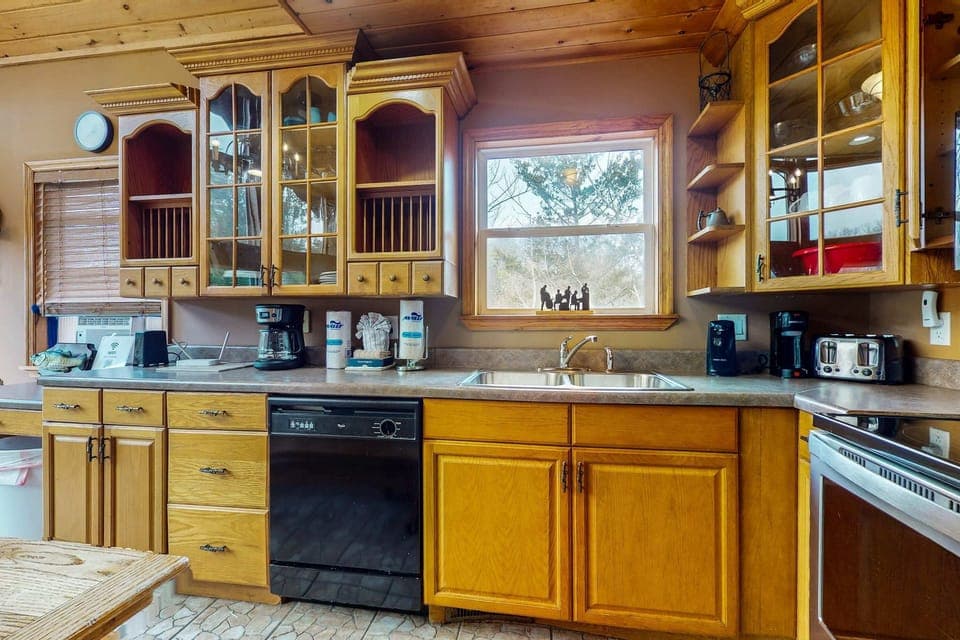 Whip up culinary delights in this bright, well-equipped kitchen with nature views!