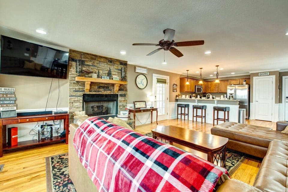 Family Lounge | Stone Fireplace, Smart TV & Open Layout