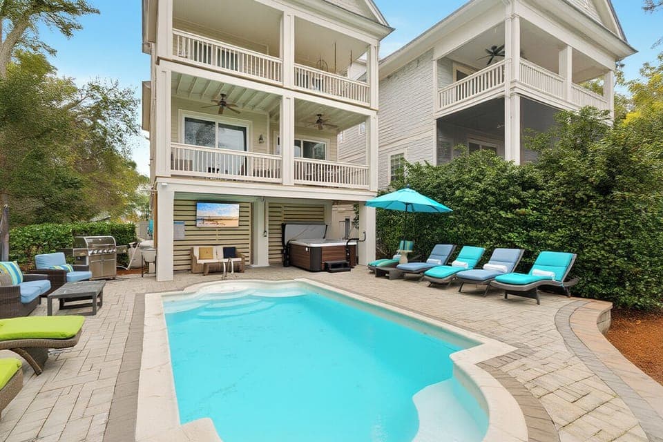 Host & Home presents…29 Sandcastle Court! Relax on multiple balconies or in your private outdoor heated pool with an expansive patio overlooking a serene lagoon.