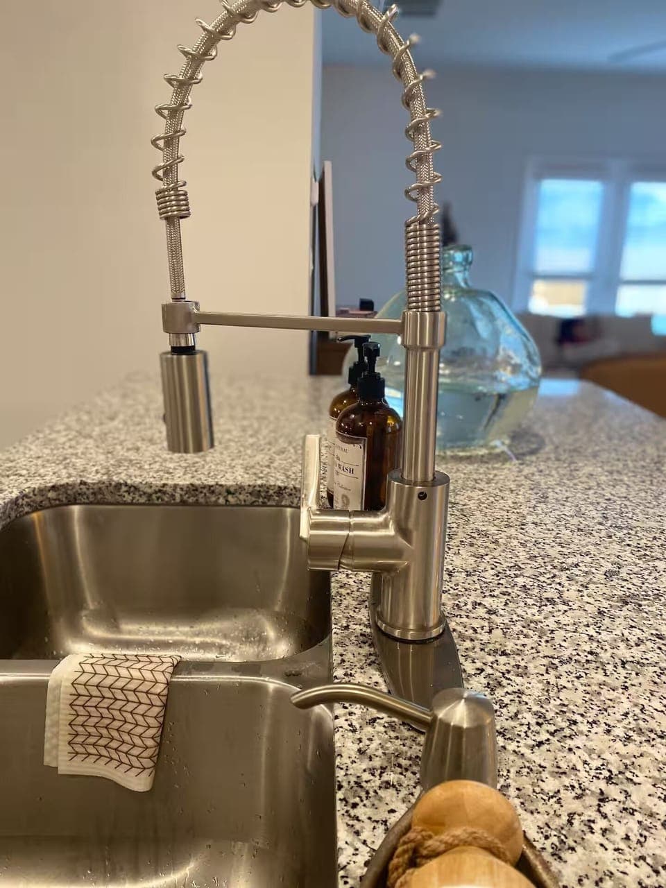 Modern kitchen details with upgraded fixtures and granite countertops.