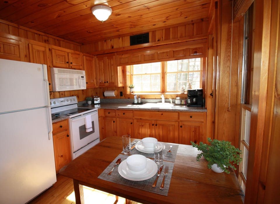 LOWER SUITE: Fully equipped kitchen so you can effortlessly prepare meals and enjoy quiet mornings or cozy evenings together.