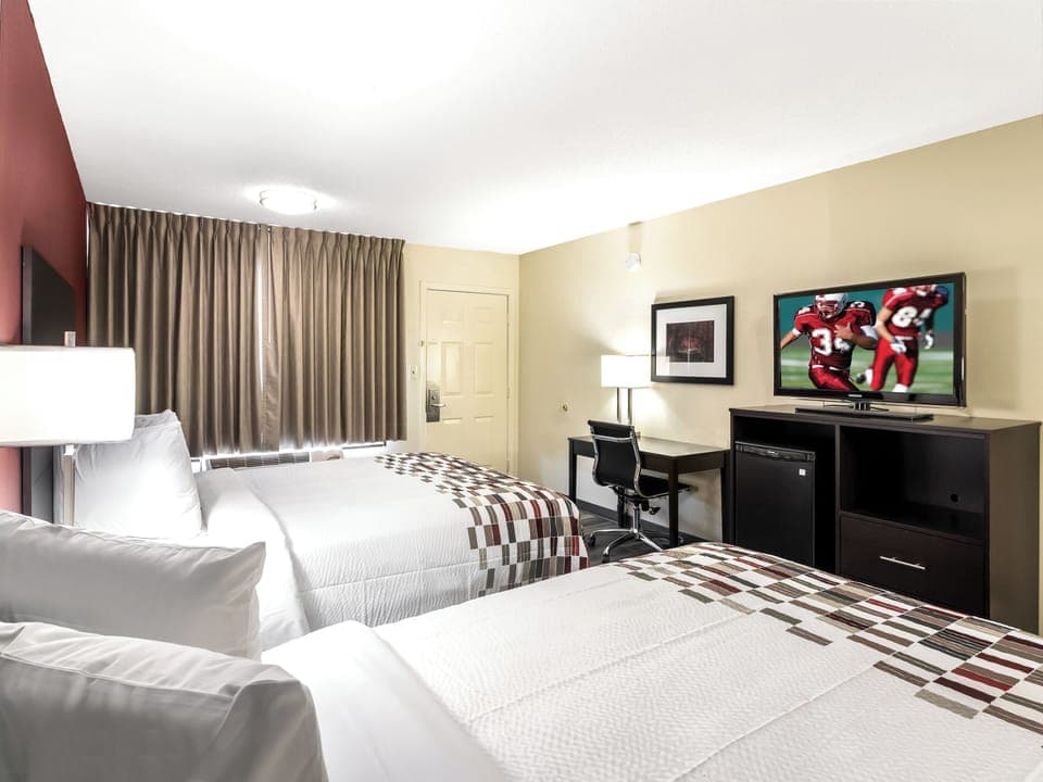 Unwind in crisp beds after a full day exploring.