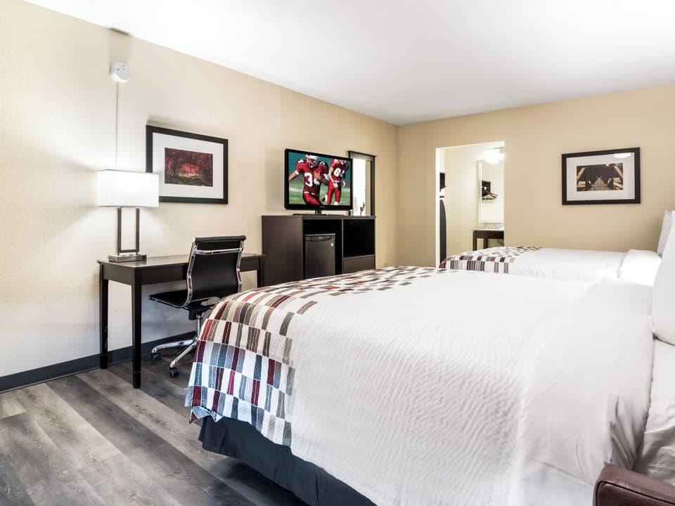 Gather everyone in a spacious double-queen room, effortlessly.