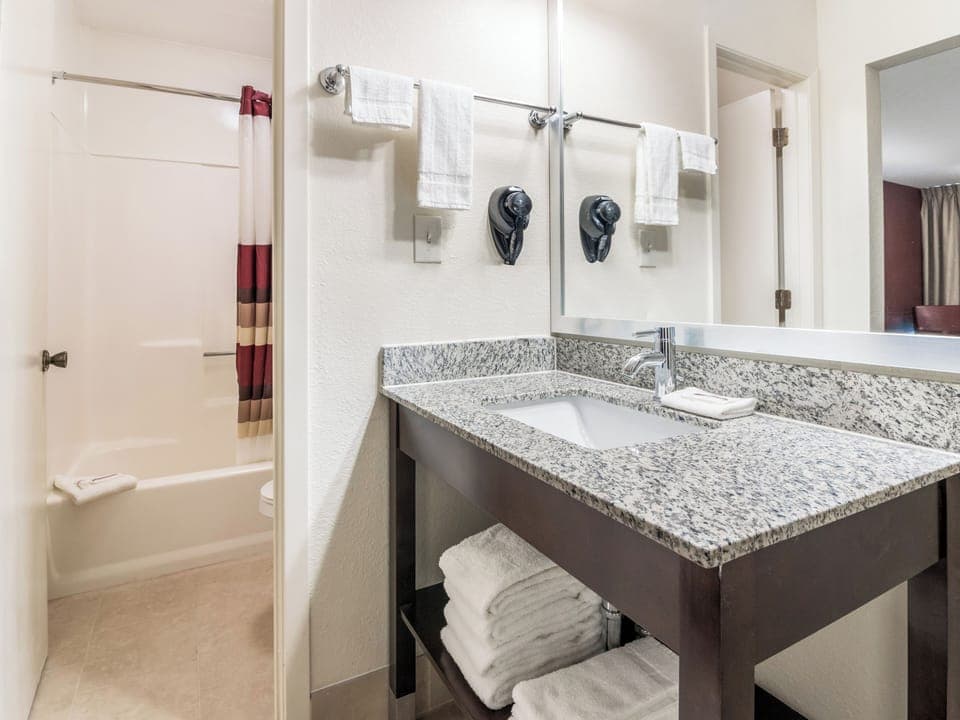 Refresh in a spotless bath with plush towels ready.