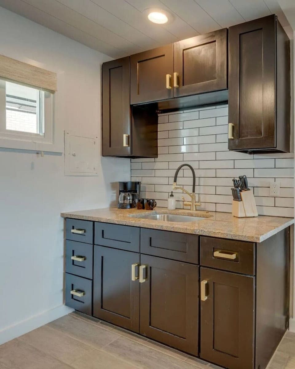 Cook, wash, and dine in a complete kitchen setup.
