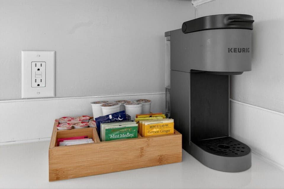 Enjoy the provided coffee, creamer, sugar and tea to start your mornings off right
