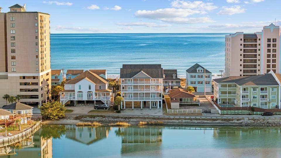 Marsh views in front, ocean behind, easy beach days and glowing sunsets.