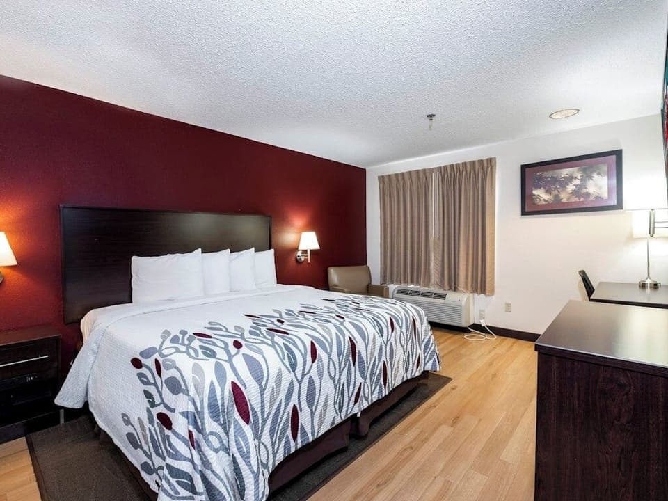 Settle into a bright, spacious room with plush king comfort.