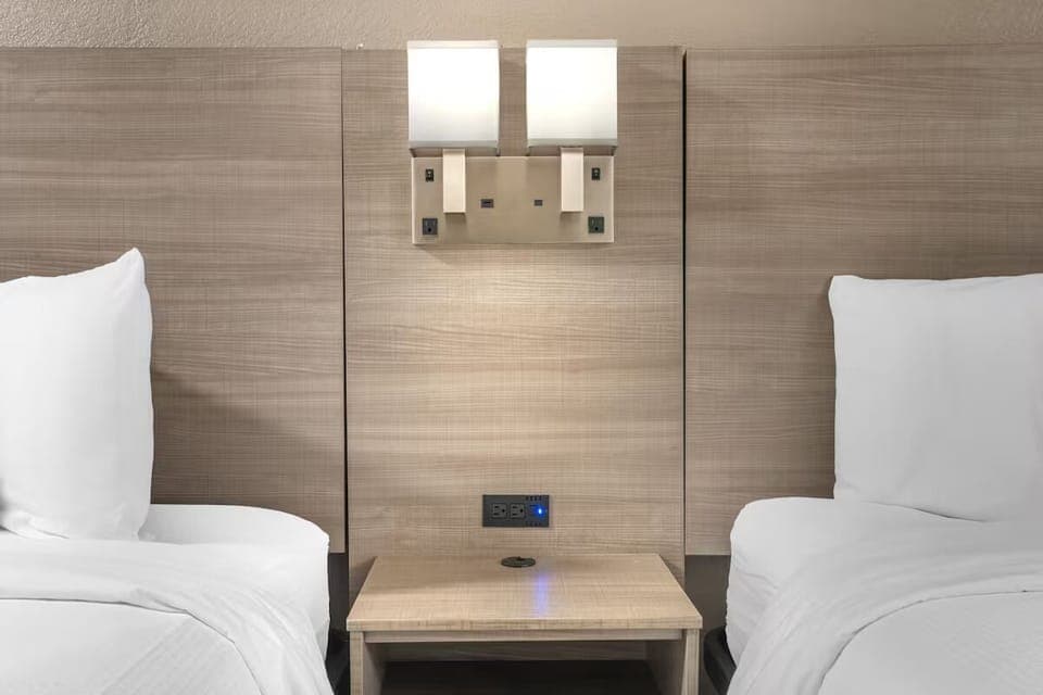 Recharge devices bedside and drift off in quiet comfort.
