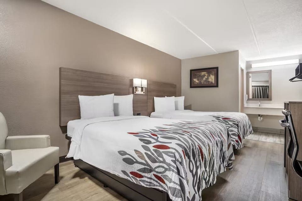Settle into two cozy beds in a calm, quiet room.