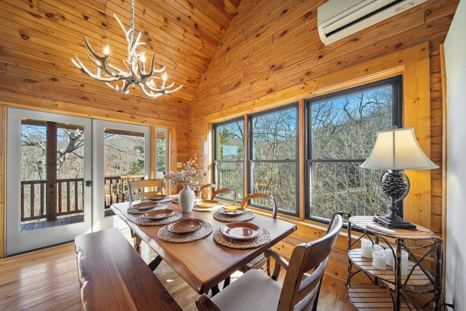 Raw Edge Dining Table Surrounded by Windows