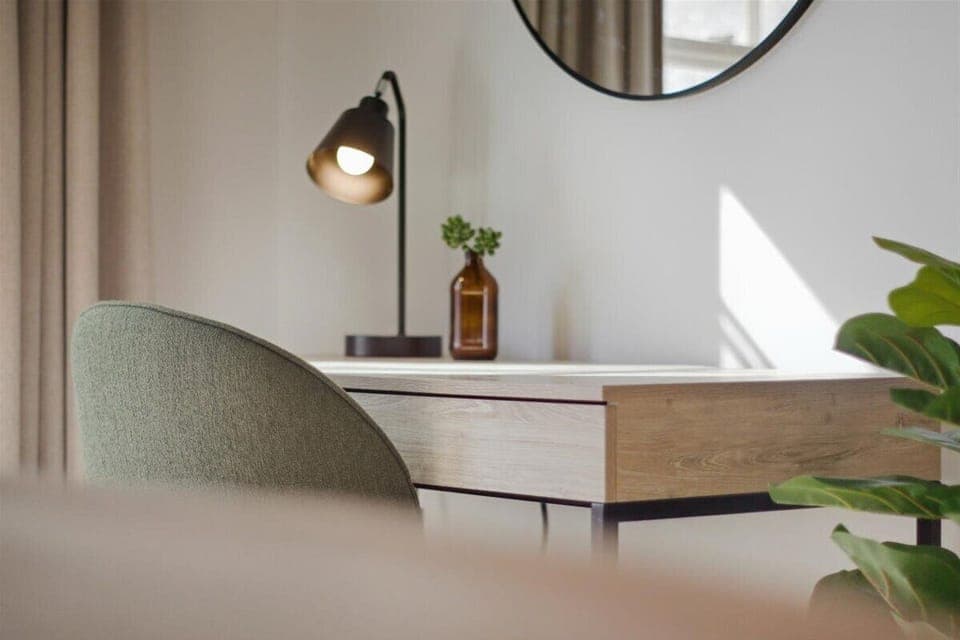 Sunny king bedroom—perfect for working